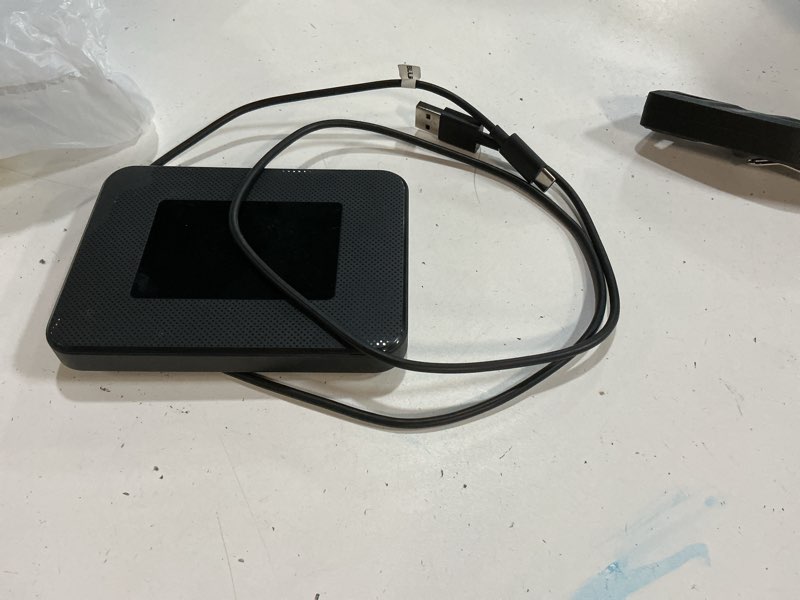 Condition photo showing As Is for straight talk blu m100 hotspot, 5g, 8gb, black. prepaid hotspot [locked to straight talk]