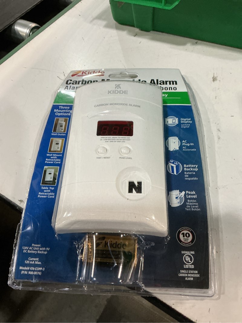Condition photo showing Good Condition for kidde carbon monoxide detector, plug in wall with 9-volt battery backup, digital led display 1 pack white