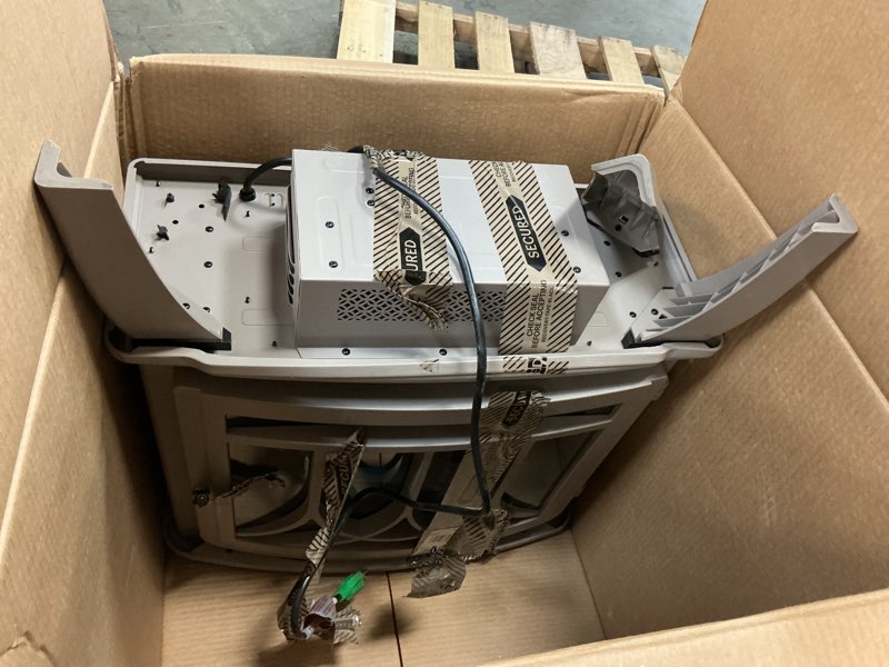 Condition photo showing As Is for Duraflame heater 