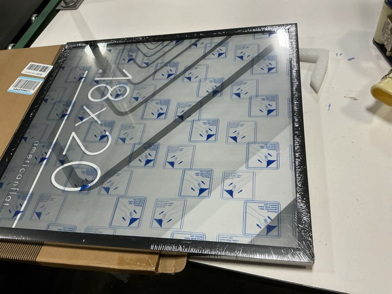 Condition photo showing Good Condition for Americanflat 18x20 Picture Frame with Polished Plexiglass - Streamline Collection - Thin Border Picture Frame for Wall Display - Hanging Hardware Included - Black 18x20 Black