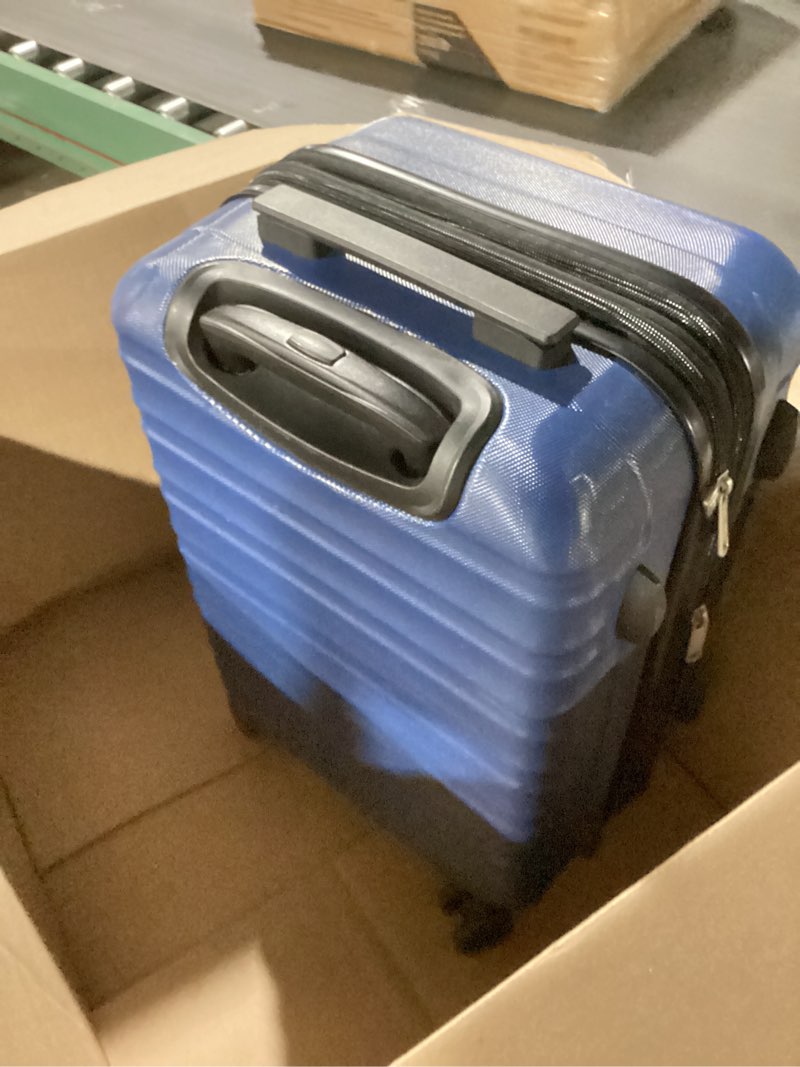 Condition photo showing Good Condition for Amazon Basics 21" Hardside Carry-On Luggage, Hardshell Suitcase With Wheels, Expandable For Up to 25% More Space, With Scratch-Resistant Surface, Four Multi-directional Wheels, Navy Blue Navy Blue Carry-On
