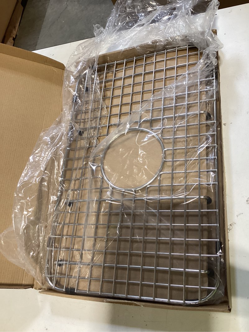 Condition photo showing Good Condition for serene valley sink bottom grid 20" x 13", centered drain with corner radius 2", svm2013c
