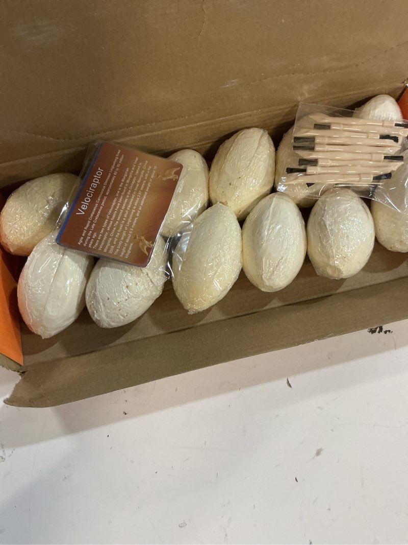 Condition photo showing New/Like New for dino eggs dig kit 12pcs dinosaur excavation bricks toys archaeology science stem experiments toy egg hunt party gift for kids 6-12 years old and up boys girls