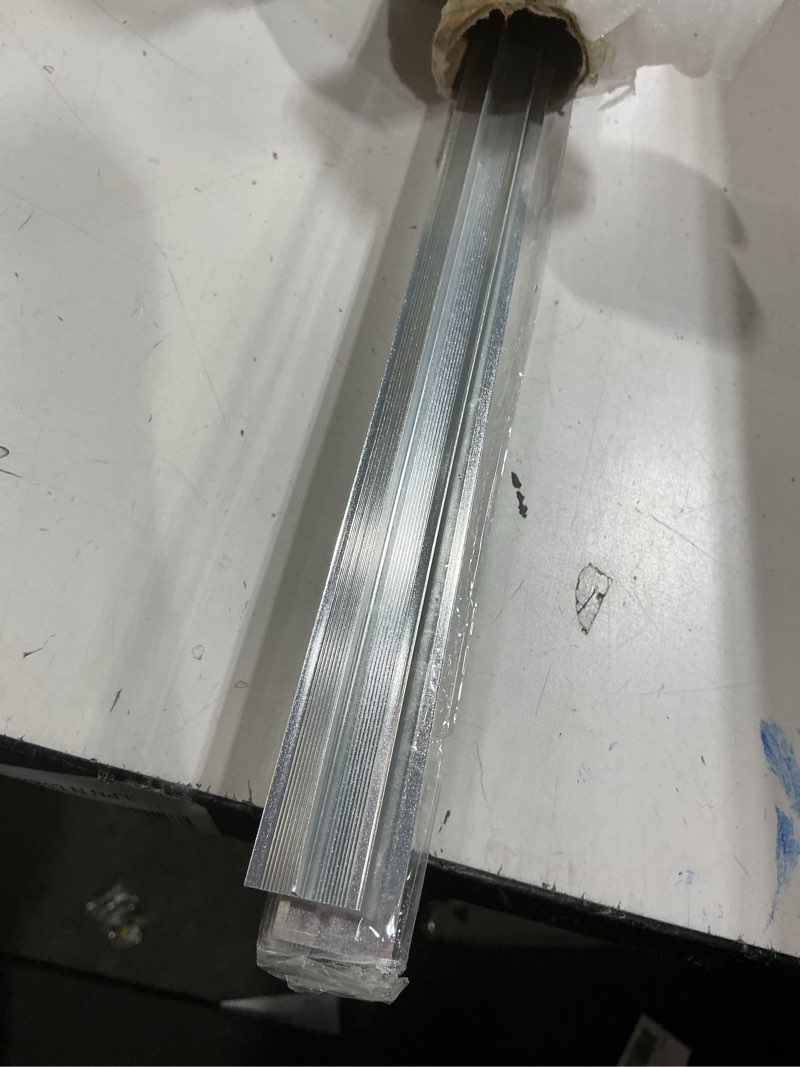 Condition photo showing New/Like New for uxcell 3Pcs 4ft x 0.79" T Molding Floor Transition Strips, Aluminium Alloy Vinyl Flooring Gap Trim for Joining Laminate Planks Tiles Floor Gaps, Matte Silver Matte Silver 4ft x 0.79"