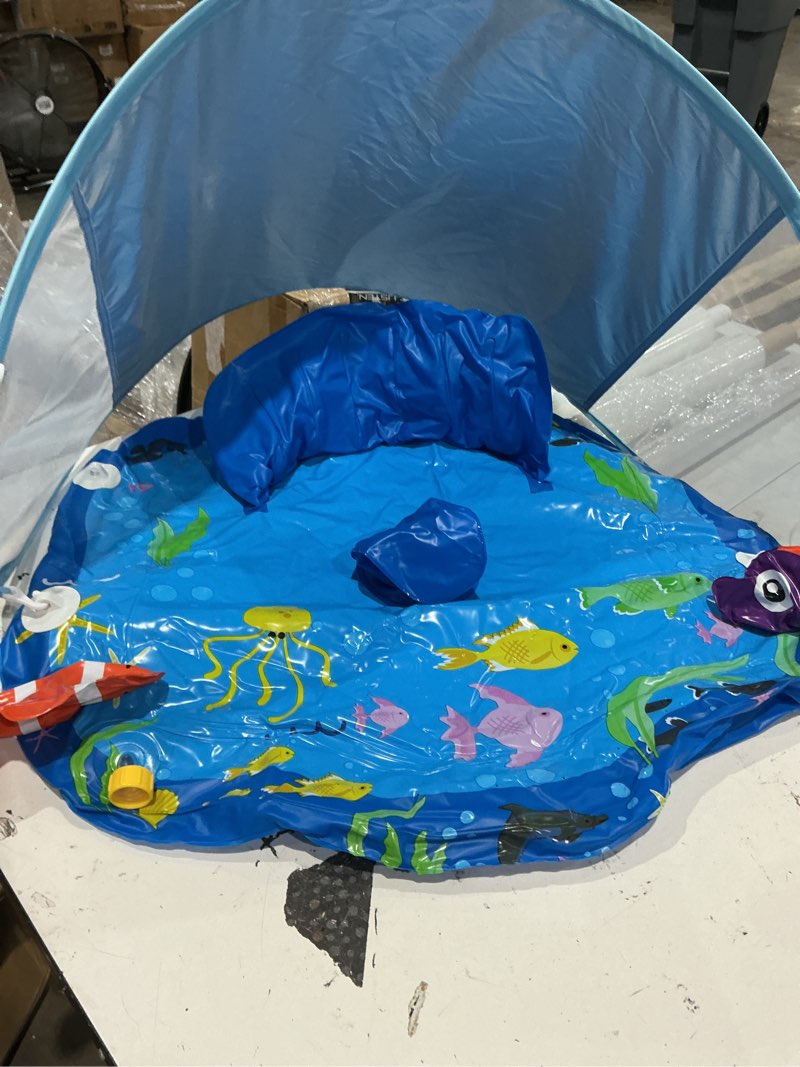 Condition photo showing As Is for baby pool float with sprinkler, inflatable baby splash pad with stackable rings game, baby splash mat with canopy & backrest for toddlers garden, beach, backyard and bathroom (blue)