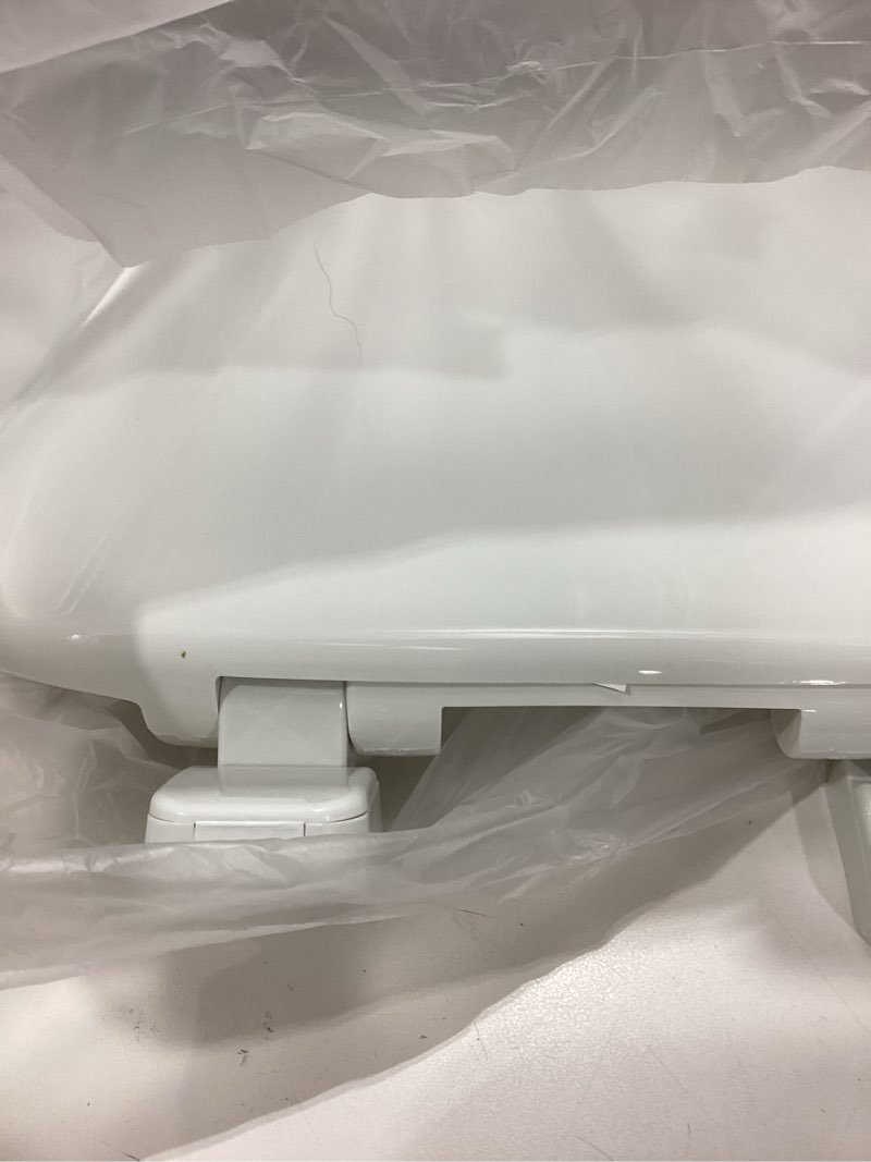 Condition photo showing As Is for mayfair caswell modern slow close toilet seat, durable plastic, elongated, white elongated 1 seat