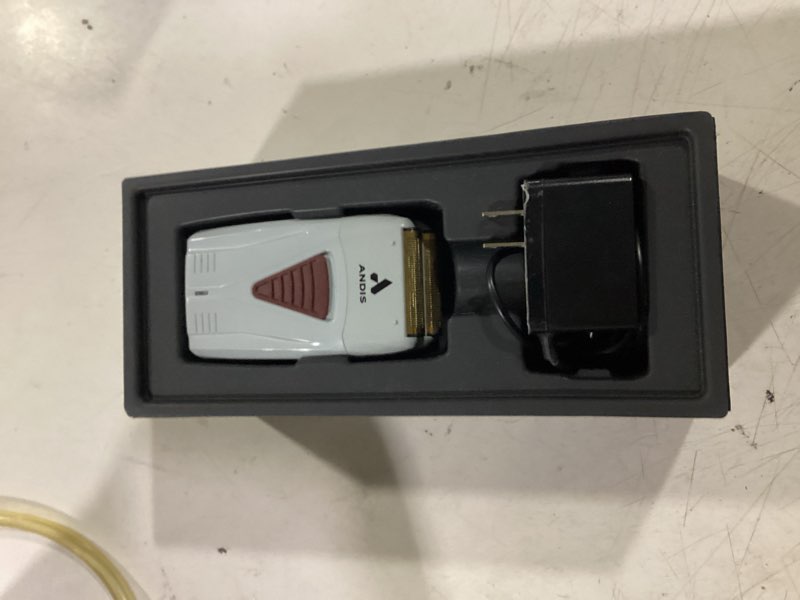 Condition photo showing Good Condition for andis 563616 pro foil plus ii cordless shaver, black | gold titanium foils, lithium ion battery, includes usb-c charging stand black foil shaver