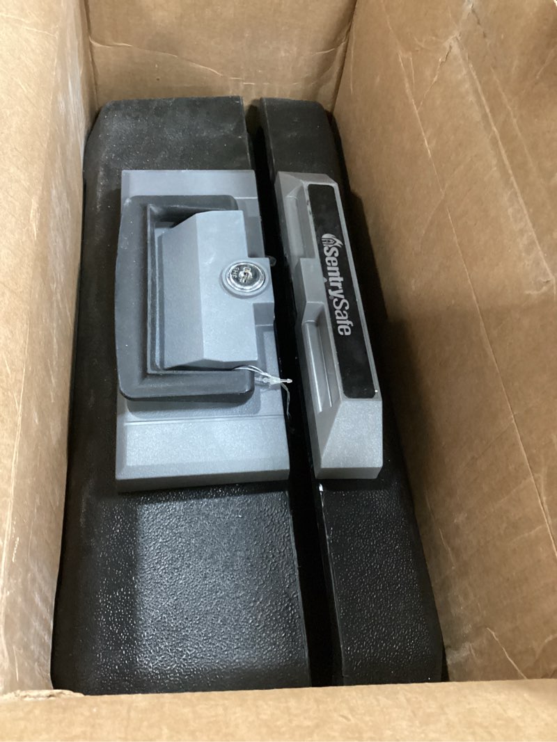 Condition photo showing Good Condition for SentrySafe Fireproof Safe Box with Key Lock, Chest Safe with Carrying Handle to Secure Money, Jewelry, Documents, 0.25 Cubic Feet, 6.3 x 15.3 x 12.1 Inches, 1160 Fire resistant box 0.25 cu. ft.