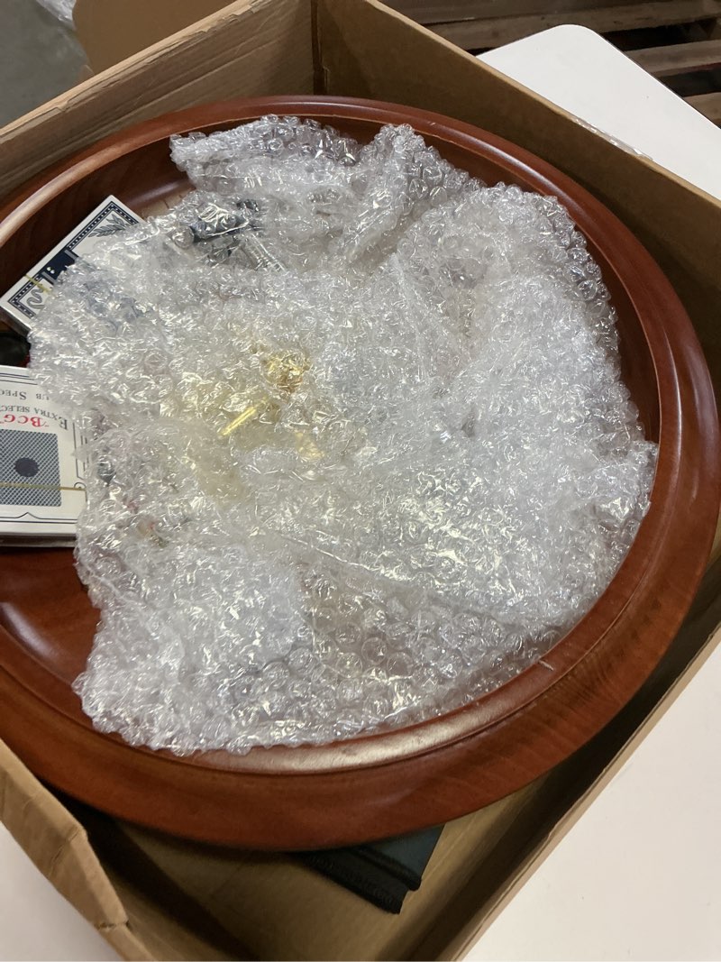 Condition photo showing Good Condition for extguds roulette wheel game set with large felt, 16 inch roulette wheel, retractable chip rake? 200 chips, roulette marker, 2 decks of cards, 3 dices, canvas bag, commonly used games at parties
