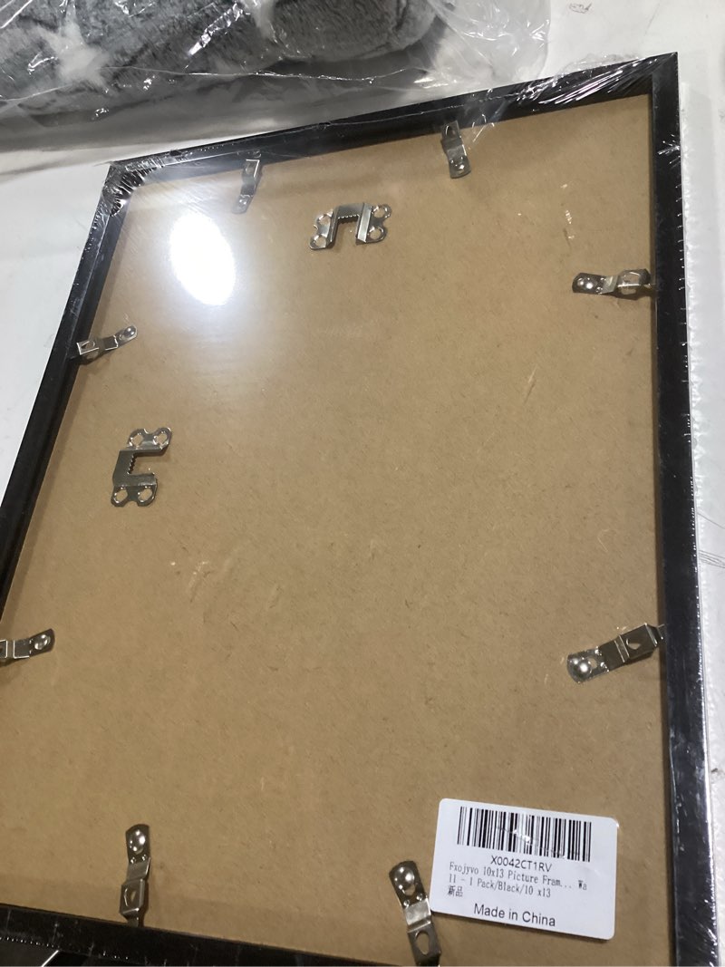Condition photo showing Good Condition for fxojyvo 10x13 picture frame, black frame for 10 x 13 inch picture poster photo, light weight and high transparent 10 by 13 frame for wall - 1 pack/black/10 x13 black 10x13 1 pack