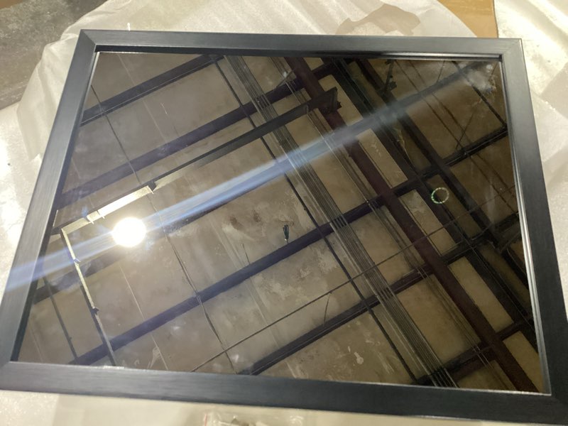 Condition photo showing New/Like New for Viyyiea framed lighted mirror