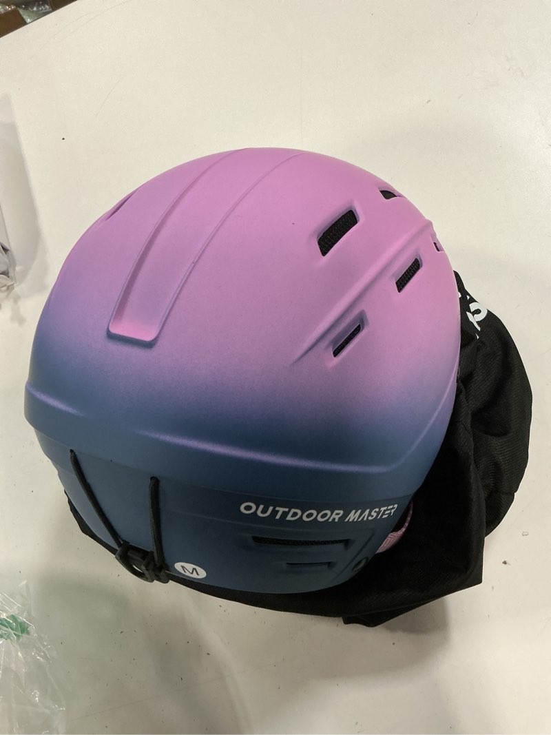 Condition photo showing New/Like New for outdoormaster kelvin ii ski helmet and wireless bluetooth set - adjustable fit snowboard helmet with drop-in headphone - snow sports helmet for men women & youth gradient purple blue medium (54-58cm)
