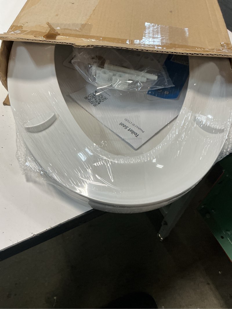 Condition photo showing New/Like New for 19" elongated toilet seat with quiet-close lid, soft close slow close cover with quick-release & quick-attach hardware, full flat white, easy clean design, grip-tight bumpers elongated (19?) standard (quick-release)