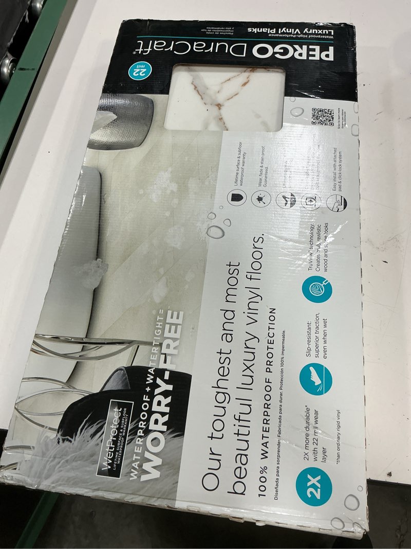 Condition photo showing Good Condition for pergo rome marble white marble look 22-mil x 12-in w x 24-in l waterproof interlocking luxury vinyl tile flooring (21.18-sq ft/ carton)