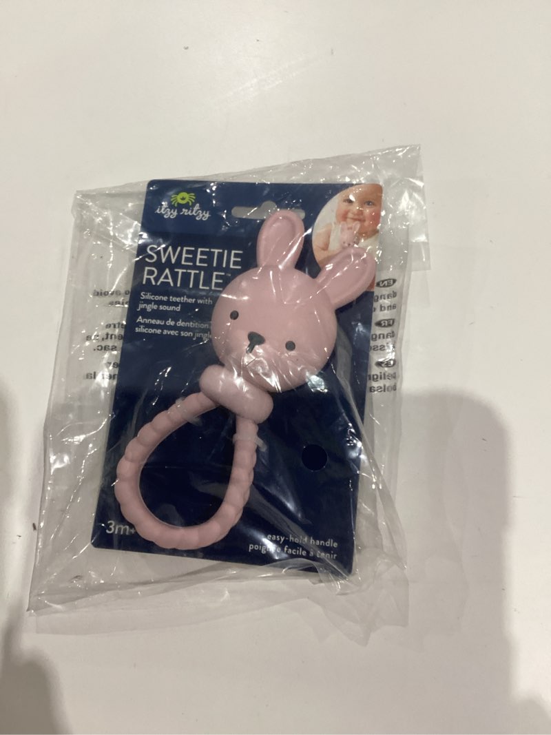 Condition photo showing New/Like New for Itzy Ritzy Silicone Rattle Toy – Soothing Teething Toy with Soft Jingle Sound & Easy-Grip Textured Handle - for Ages 3 Months and Up (Bunny)