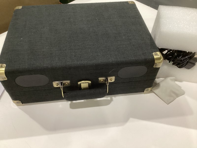 Condition photo showing Good Condition for Amazon Basics Portable Suitcase Vinyl Turntable Record Player with Built-in Speakers and Bluetooth, Supports 3-Speed, Black Suitcase - Black
