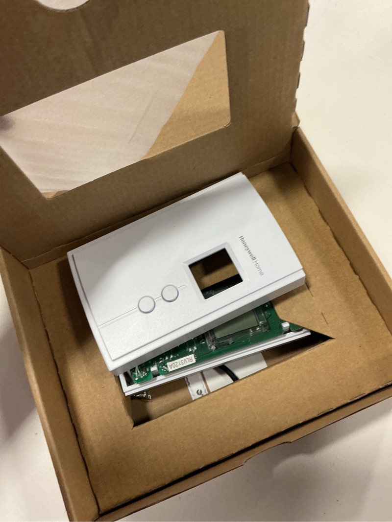 Condition photo showing As Is for Honeywell Home RLV3120A1005 Digital Non-Programmable Thermostat for Electric Heat Only