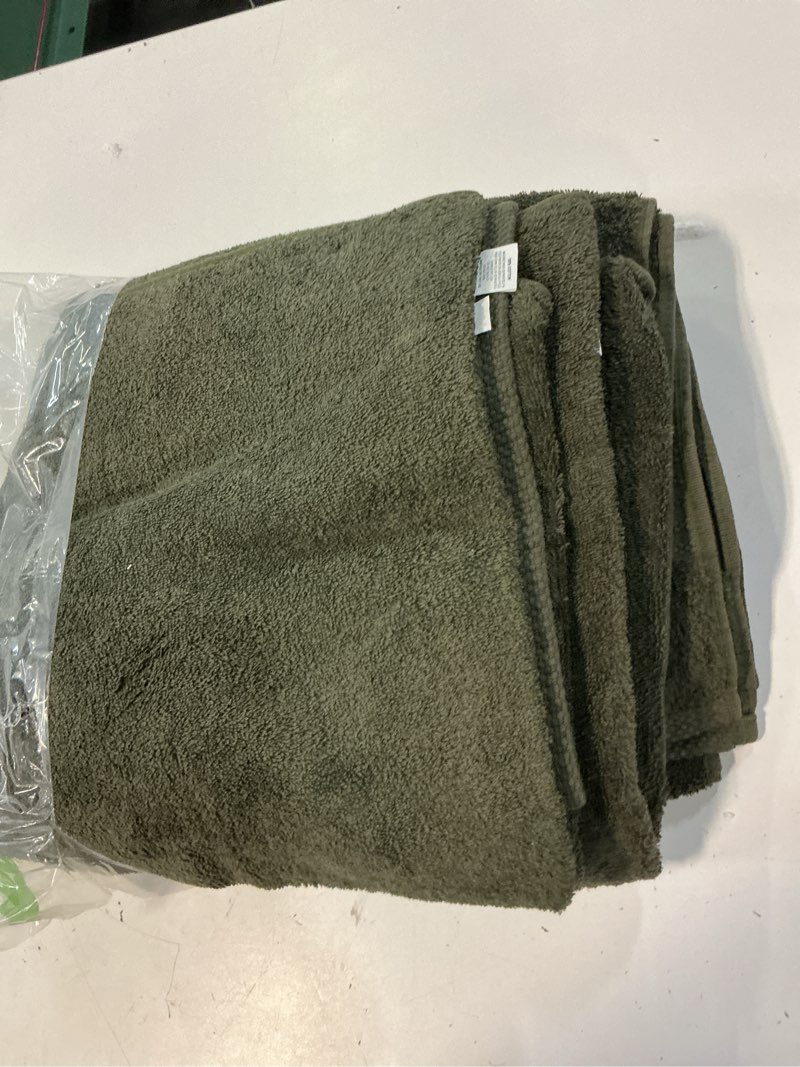 Condition photo showing As Is for glamburg premium cotton 4 pack bath towel set - 100% pure cotton - 4 bath towels 27x54 - ideal for everyday use - ultra soft & highly absorbent - olive green