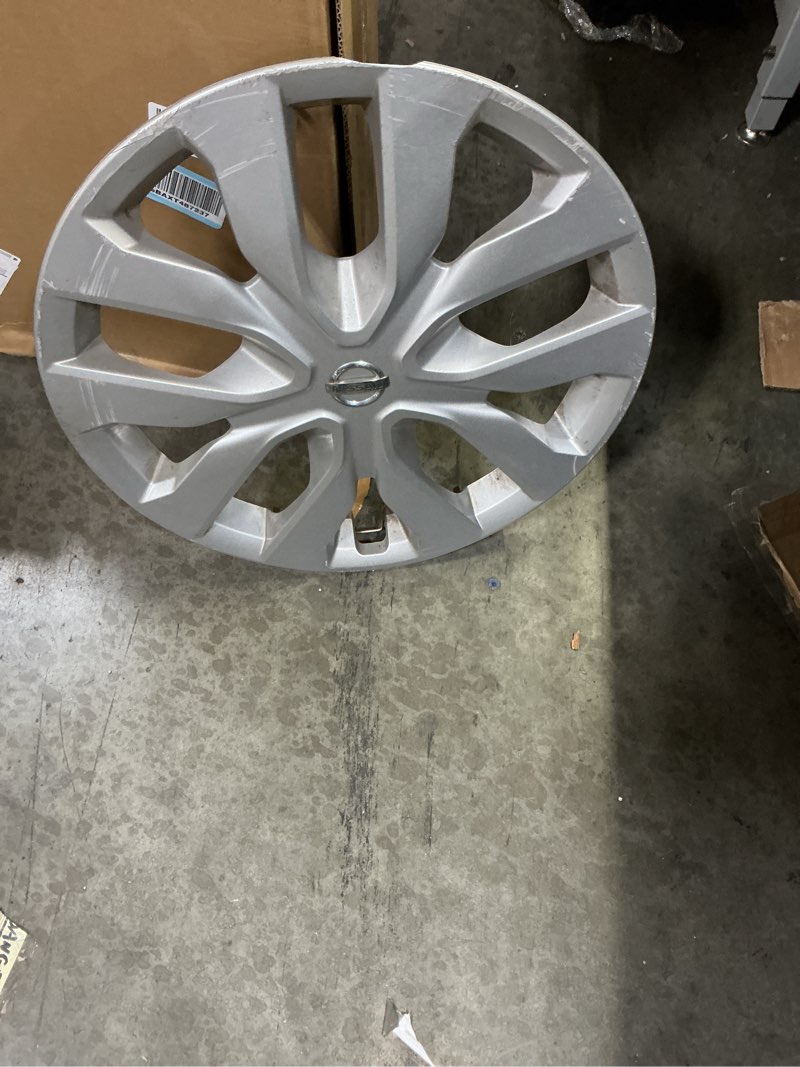 Condition photo showing As Is for CarolIna Wheel Cover 17-In. Hubcap Fits Rogue 2014 - 2020 Professionally Reconditioned OEM Nissan (2 Piece)