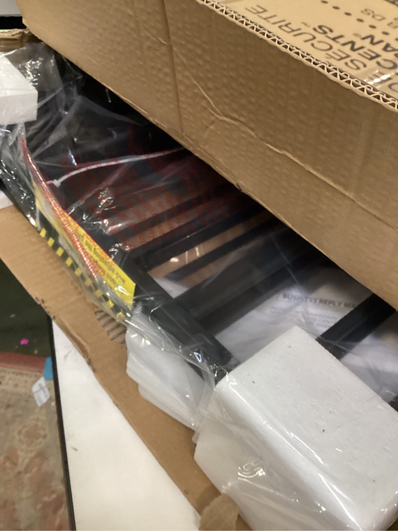 Condition photo showing New/Like New for Regalo Deluxe Home Accents Widespan Safety Gate, 74.5" W x 28" H, Includes 4 Wall Mounts, Black 74.5" W x 28" H Black