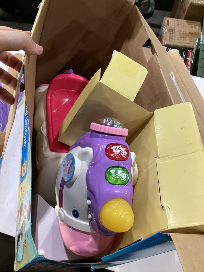 Condition photo showing New/Like New for vtech prance and rock learning unicorn