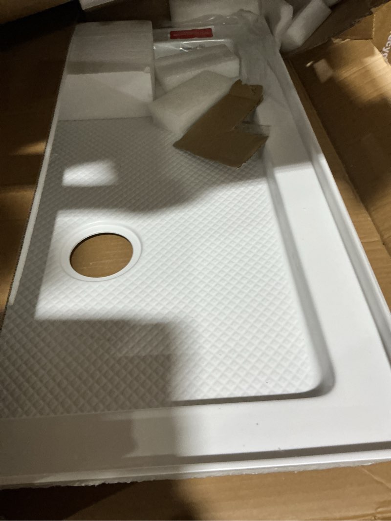 Condition photo showing Good Condition for dreamline slimline 36 in. d x 36 in. w x 2 3/4 in. h corner drain neo-angle shower base in white, dlt-2036360 36 inch w white