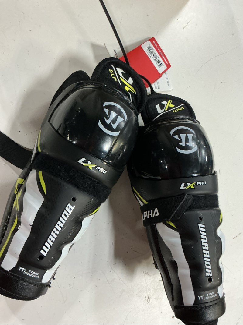 Condition photo showing New/Like New for warrior youth lx pro shin guards in black | size: 8