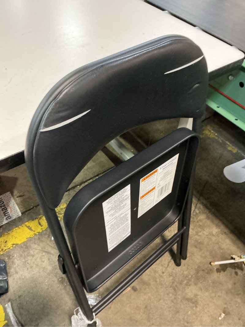 Condition photo showing As Is for cosco indoor black metal steel padded vinyl standard folding chair