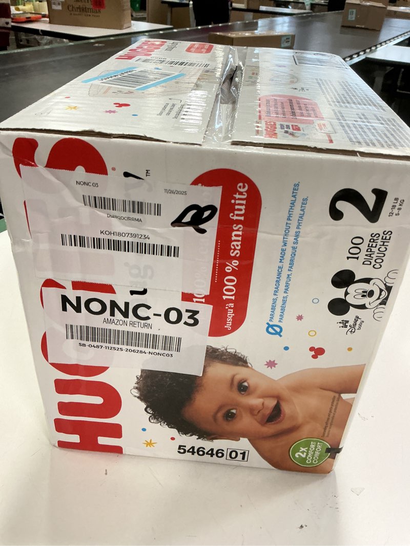 Condition photo showing New/Like New for Huggies Size 2 Diapers, Snug & Dry Baby Diapers, Size 2 (12-18 lbs), 100 Count, Packaging May Vary Size 2 100