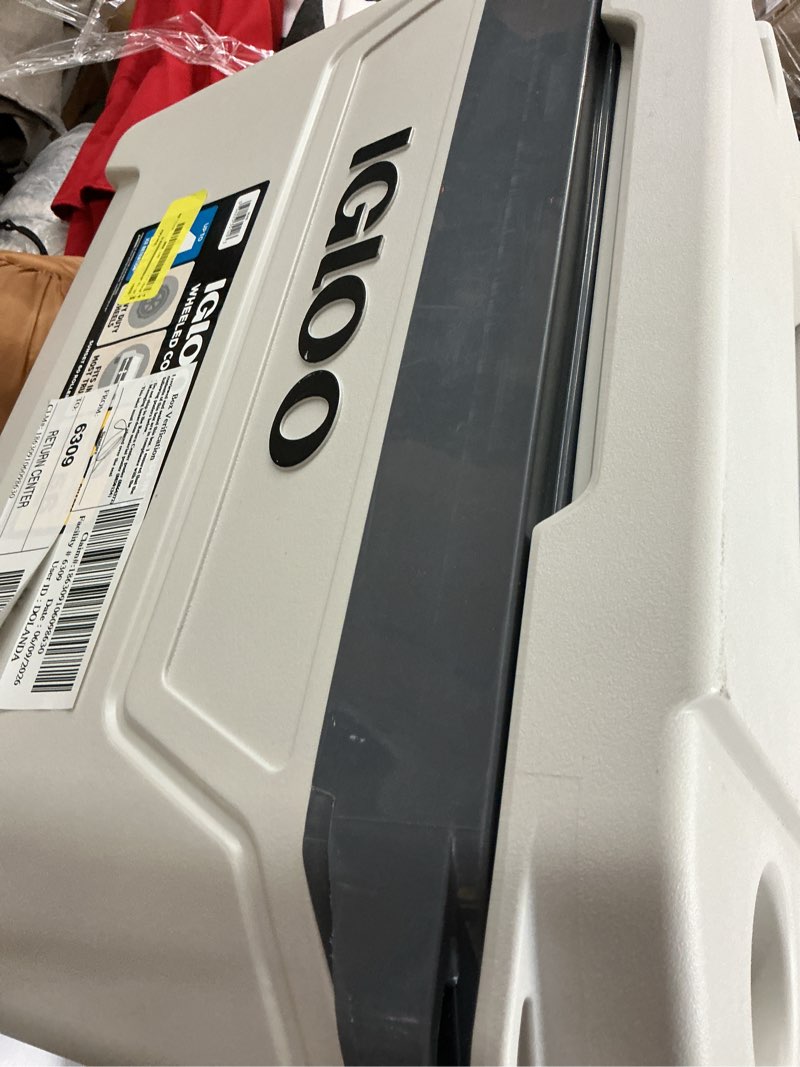 Condition photo showing As Is for igloo bone white and gray 60-quart sunset roller cooler