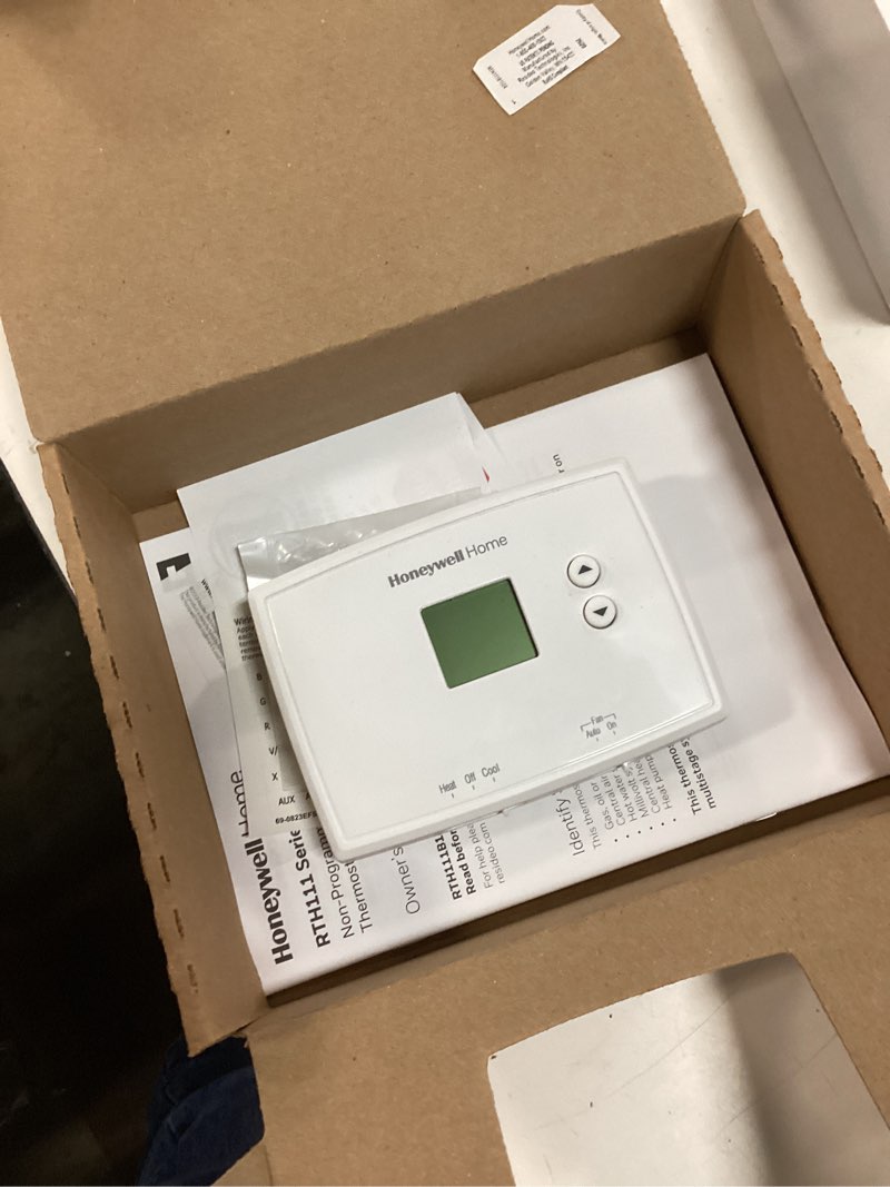 Condition photo showing As Is for honeywell thermostat, non-programmable thermostat, white, rth111b1024/e1