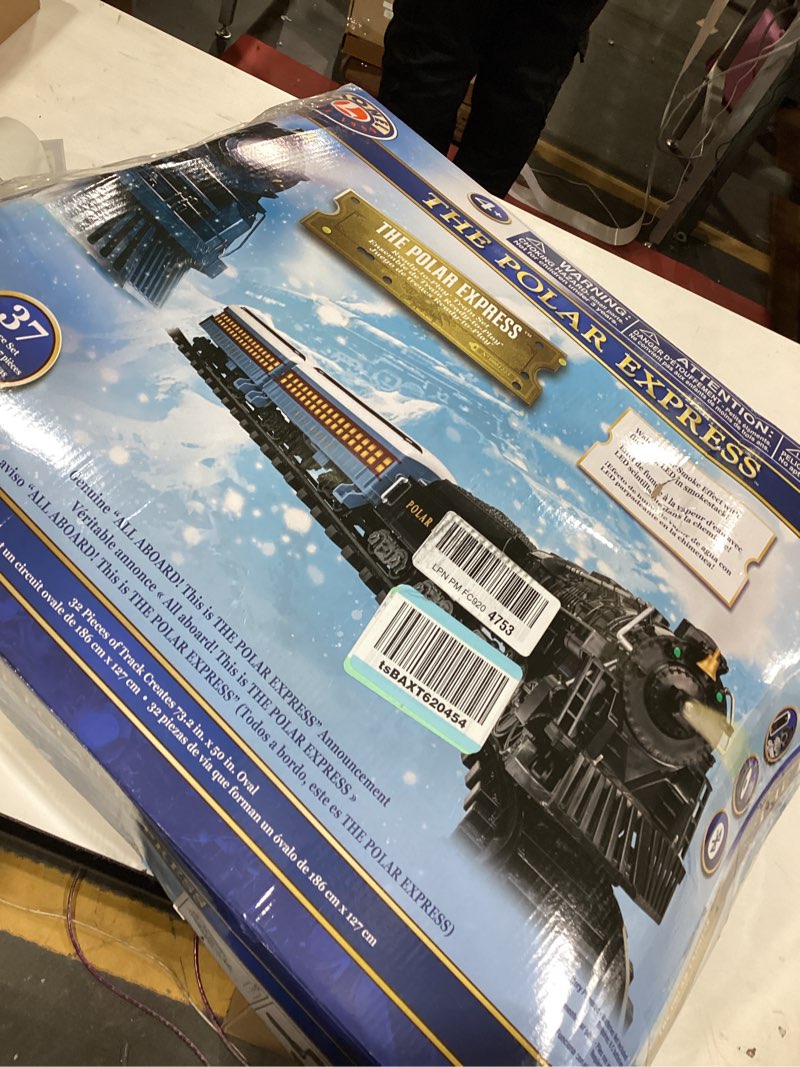 Condition photo showing As Is for Lionel Battery-Operated The Polar Express Toy Train Set with Bluetooth, Locomotive, Train Cars, & Track with Authentic Train Sounds, Lights, & Water Vapor Smoke Effects for Kids 4+