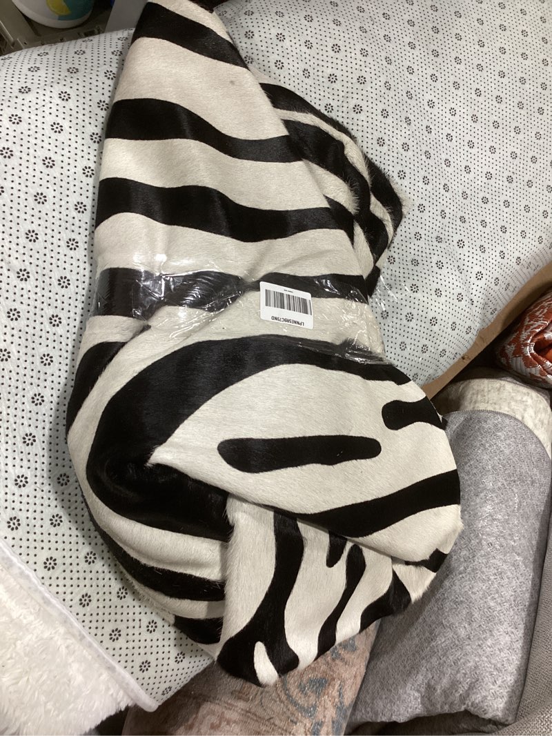 Condition photo showing As Is for Sunshine Cowhides 100% Genuine Safari Zebra Print Cowhide Rug - Modern Style Animal Skin Rug & Floor Carpet for Living Room, Bedroom, Kitchen & More - Large (6x6-7ft) 6' x 6' (Animal shape) Safari Zebra