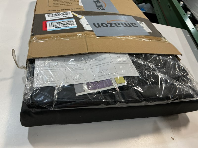 Condition photo showing Good Condition for Storage Ottoman Cube with Small Bin, 16-in Square Ottoman with Storage for Living Room and Bedroom, Small Ottomans Foot Rest, Faux Leather Foot Stools Ottomans Max 330lbs, Black 05 - Black Leather 15"D x 15"W x 15"H