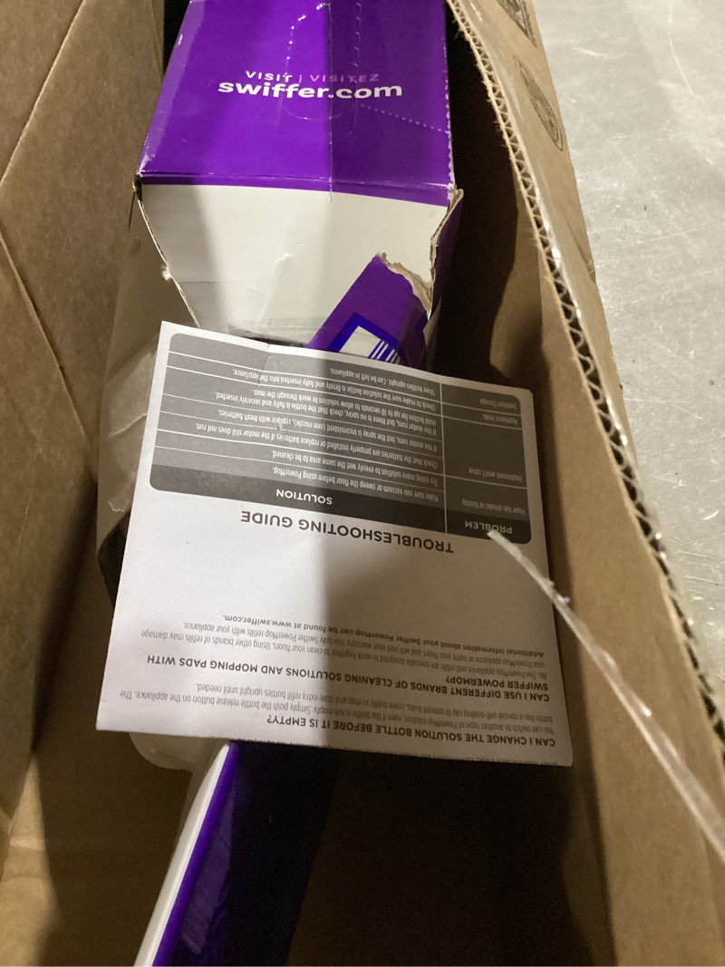 Condition photo showing As Is for swiffer powermop multi-surface mop kit for floor cleaning, includes powermop, 2 mopping pad refills, 1 cleaning solution with fresh scent and 2 batteries purple and white