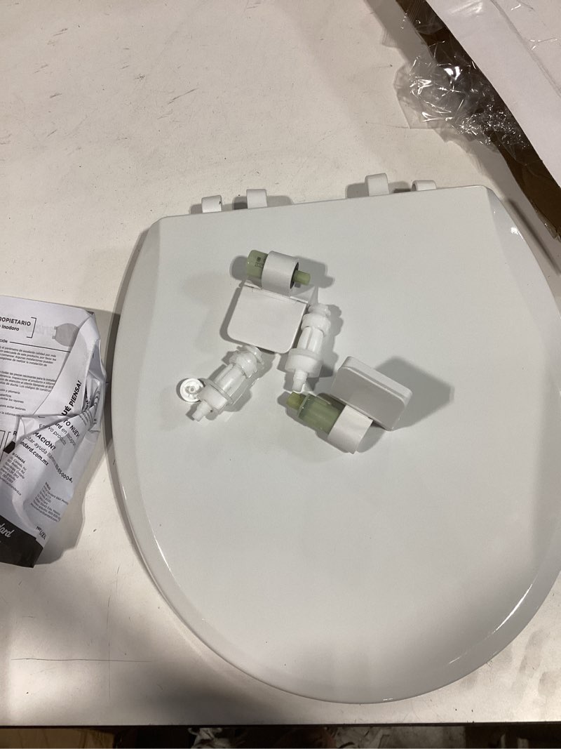 Condition photo showing As Is for american standard bedminster wood white round soft close toilet seat