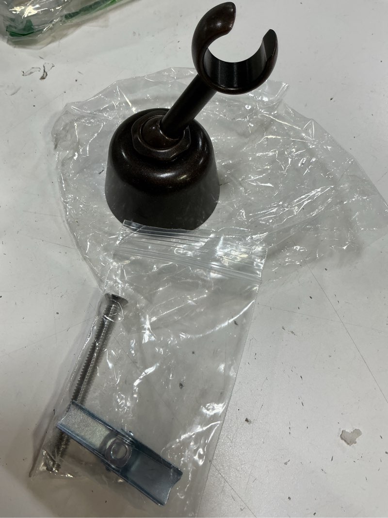 Condition photo showing As Is for moen 114348orb wall mounted handheld shower bracket kit, oil rubbed bronze