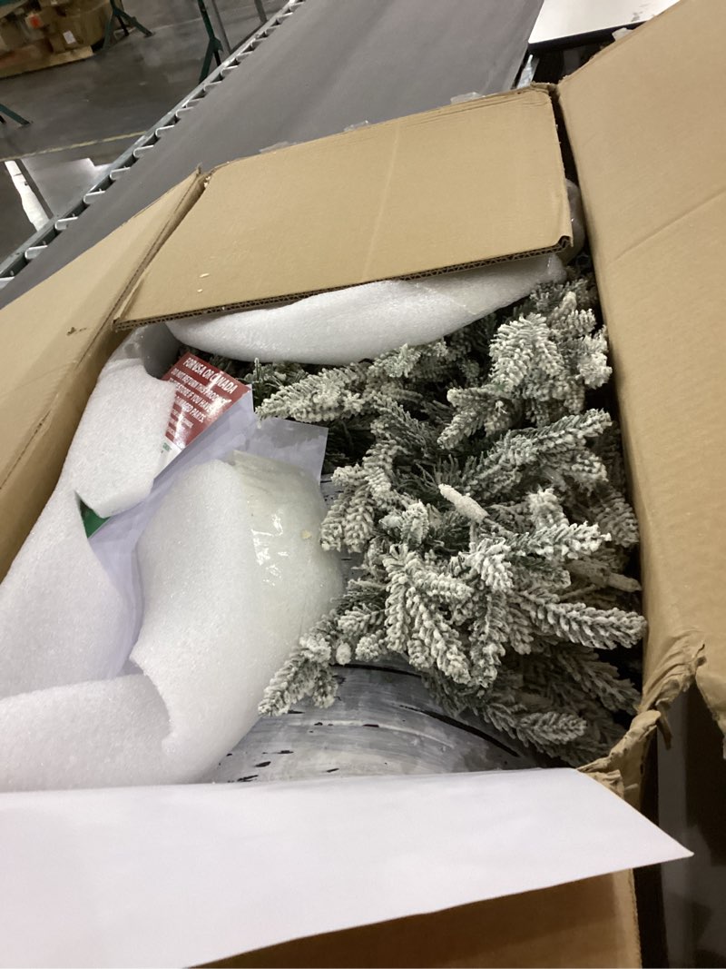 Puleo International 6ft Pre-Lit Potted Flocked Arctic Fir Pencil Christmas Tree with 120 Warm White 