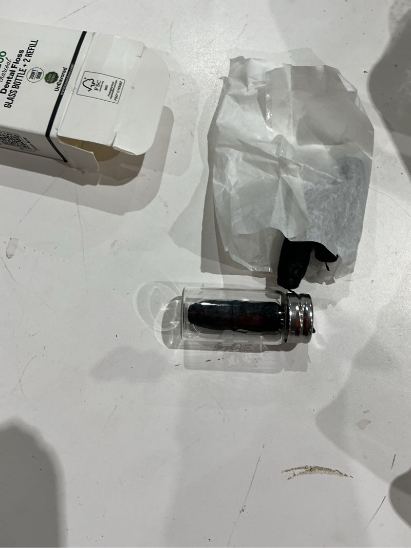 Condition photo showing Good Condition for dental floss, charcoal woven threads, refillable glass bottle, 3 pieces, unflavored