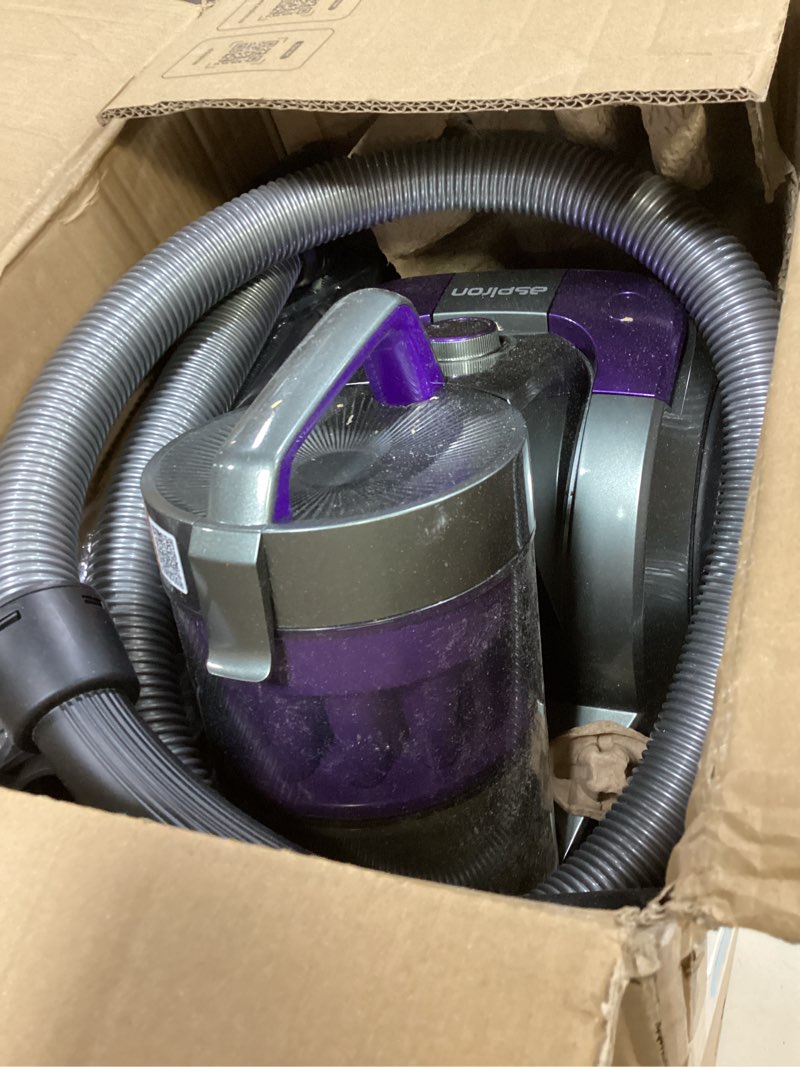Condition photo showing As Is for aspiron 1700w canister vacuum cleaner, 45kpa bagless vacuum cleaner, multi-cyclonic filtration, 2 anti-allergen hepa filters, 3.5qt dust cup, 4 tools, corded vacuum for hard floor, pet hair, wisteria