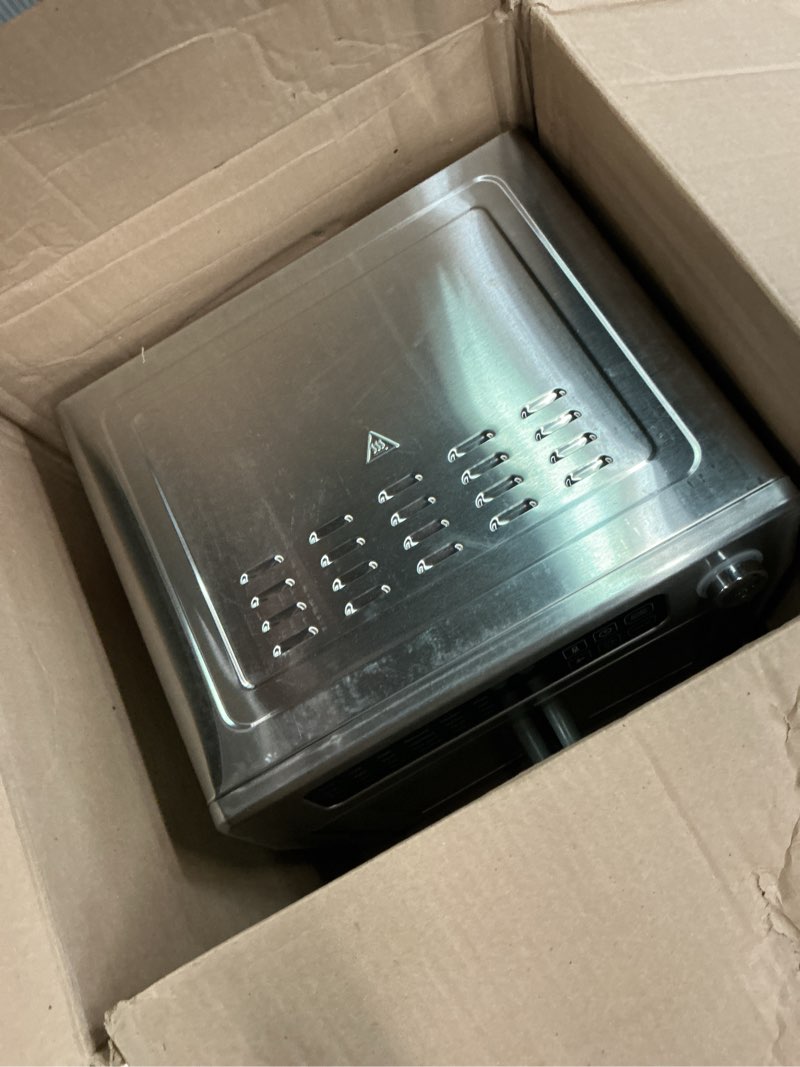 Condition photo showing As Is for Dan - Emeril Lagasse Extra Large French Door Air Fryer Toaster Oven Combo, 24 Cooking Functions and Digital Controls, 7 Accessories Included, Stainless Steel Finish, 26QT Capacity