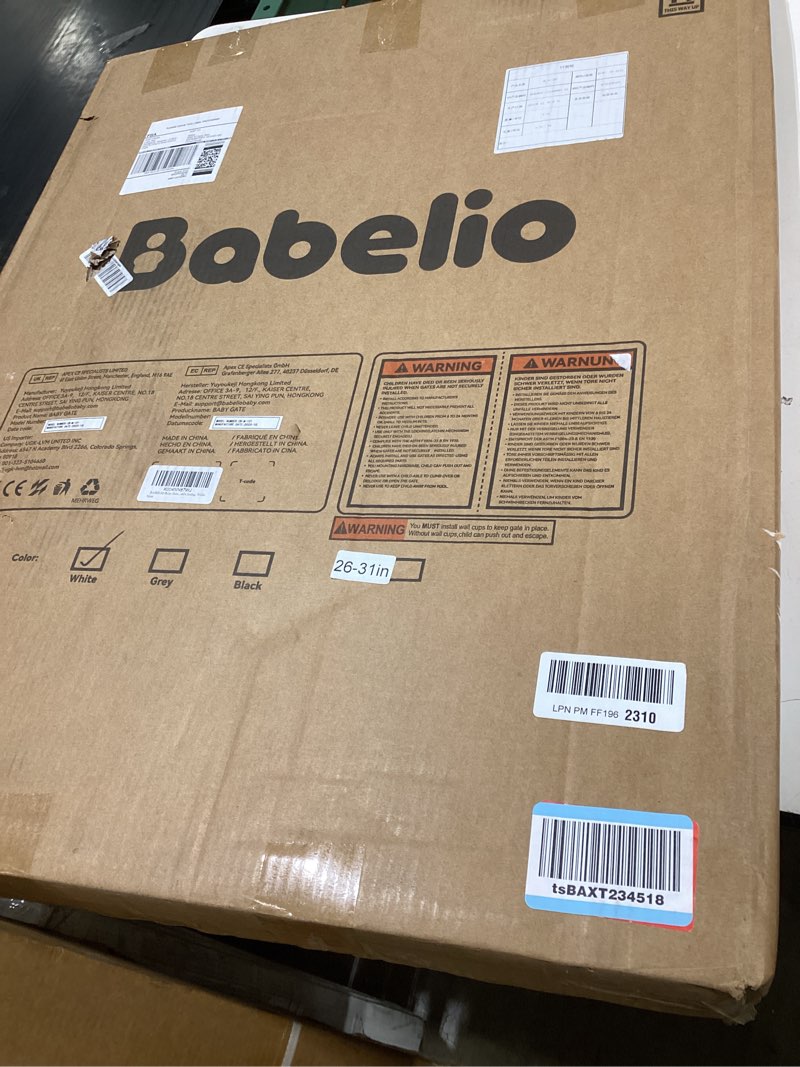 Condition photo showing Good Condition for BABELIO Baby Gate for Doorways and Stairs, 26-31" Pet Gate with Wide Walk Thru Door and Lock Indicator, No Drill Pressure Mounted Safety Gate with Double Lock and Self-Closing, White White 26-31"W, 30"H