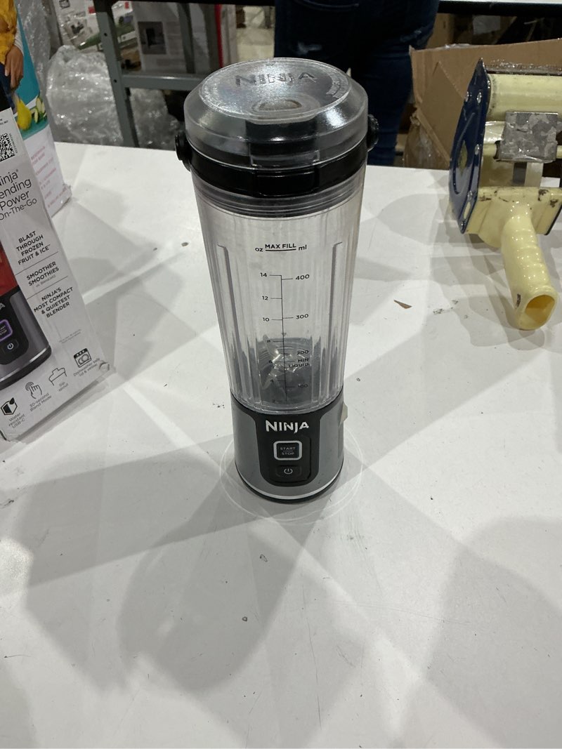 Condition photo showing As Is for ninja bc151bk blast portable blender, cordless, 18oz. vessel, personal blender-for shakes & smoothies, bpa free, leakproof-lid & sip spout, usb-c rechargeable, dishwasher safe parts, black