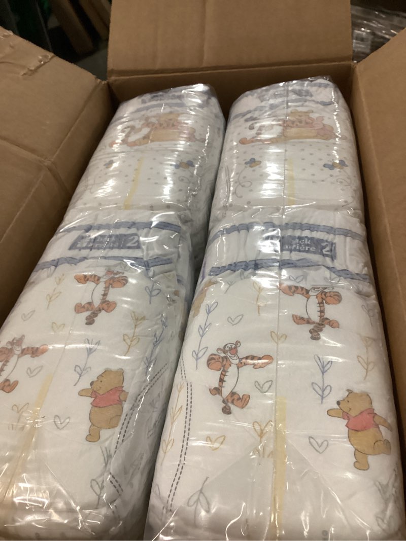 Condition photo showing New/Like New for Huggies Size 2 Diapers, Little Snugglers Baby Diapers, Size 2 (12-18 lbs), 148 Count Size 2 148
