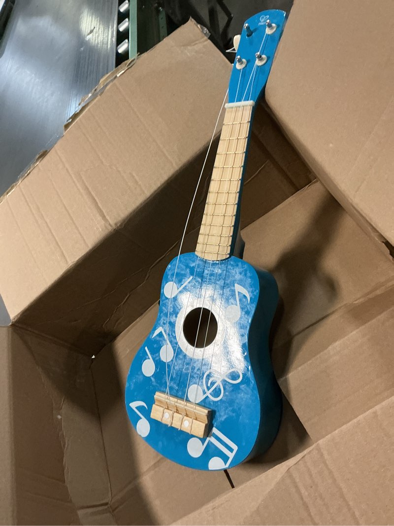 Condition photo showing As Is for Hape Kid's Wooden Toy Ukulele in Multicolor Dot Blue