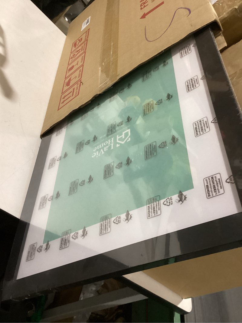 Condition photo showing As Is for LaVie Home 16 x 22 Picture Frame Black Poster Frame,Display Pictures 12x18 with Mat or 16x22 Without Mat, Stable and Sturdy Frame and Polished Plexiglass, Horizontal and Vertical Format of The Walls 16x22 Black