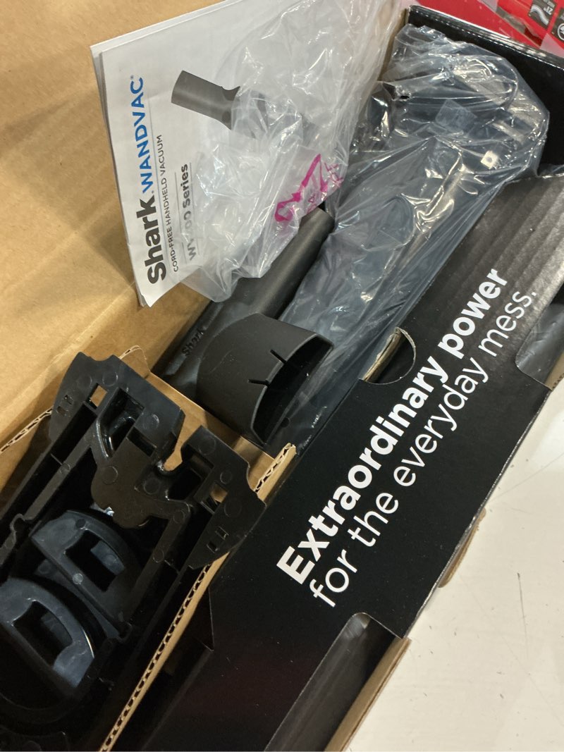Condition photo showing As Is for shark wv201 wandvac handheld vacuum, lightweight at 1.4 pounds with powerful suction, charging dock, single touch empty and detachable dust cup,graphite, slate