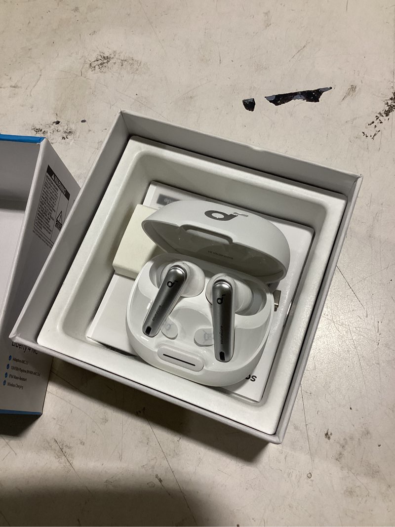 Condition photo showing As Is for soundcore by anker liberty 4 nc noise cancelling earbuds, 98.5% noise reduction, adaptive noise cancelling to ears and environment, hi-res sound, 50h battery, wireless charging, bluetooth 5.3 clear white