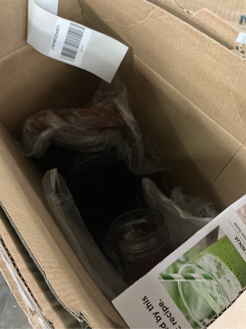 Condition photo showing As Is for ninja bn301 nutri-blender plus compact personal blender, 900-peak-watt motor, frozen drinks, smoothies, sauces & more, (3) 20 oz. to-go cups, (2) spout-lids (1) storage-lid, dishwasher safe, silver push to blend + 3 cups
