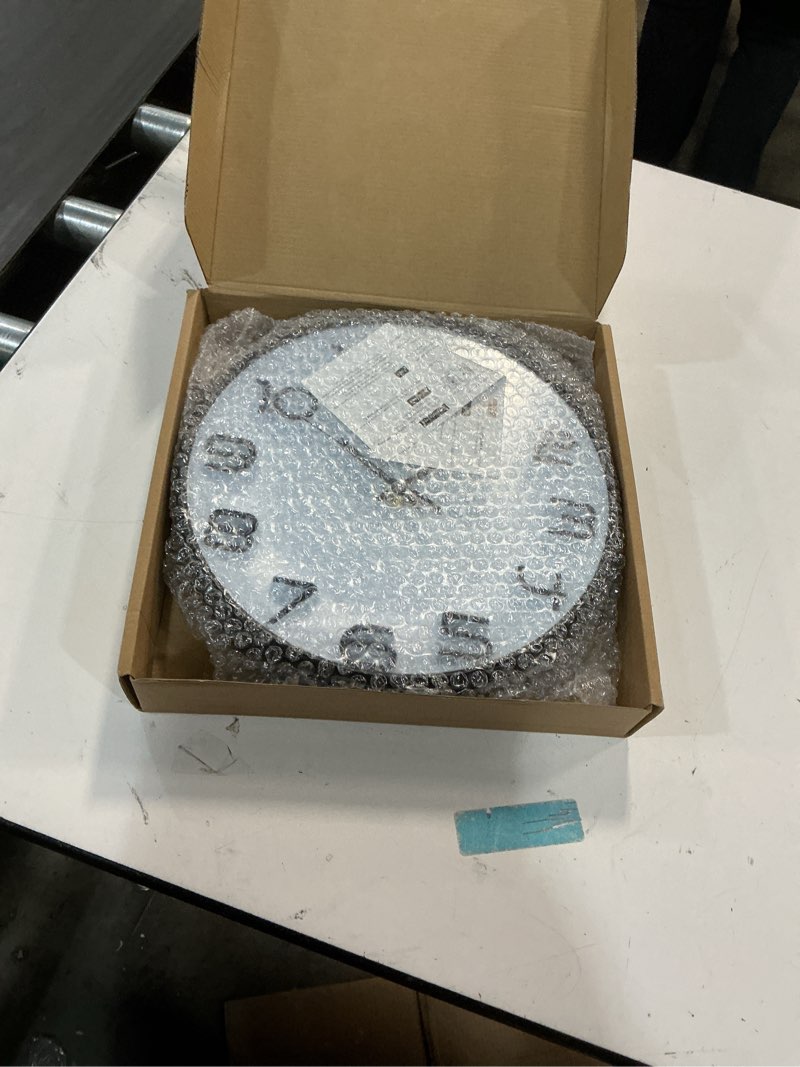 Condition photo showing New/Like New for WOOPHEN Wall Clock, 12 Inch Silent Non Ticking Battery Operated Quality Quartz Wall Clocks Modern Decorative for Bedroom Office Home, 3D Numbers Easy to Read, White 12" White